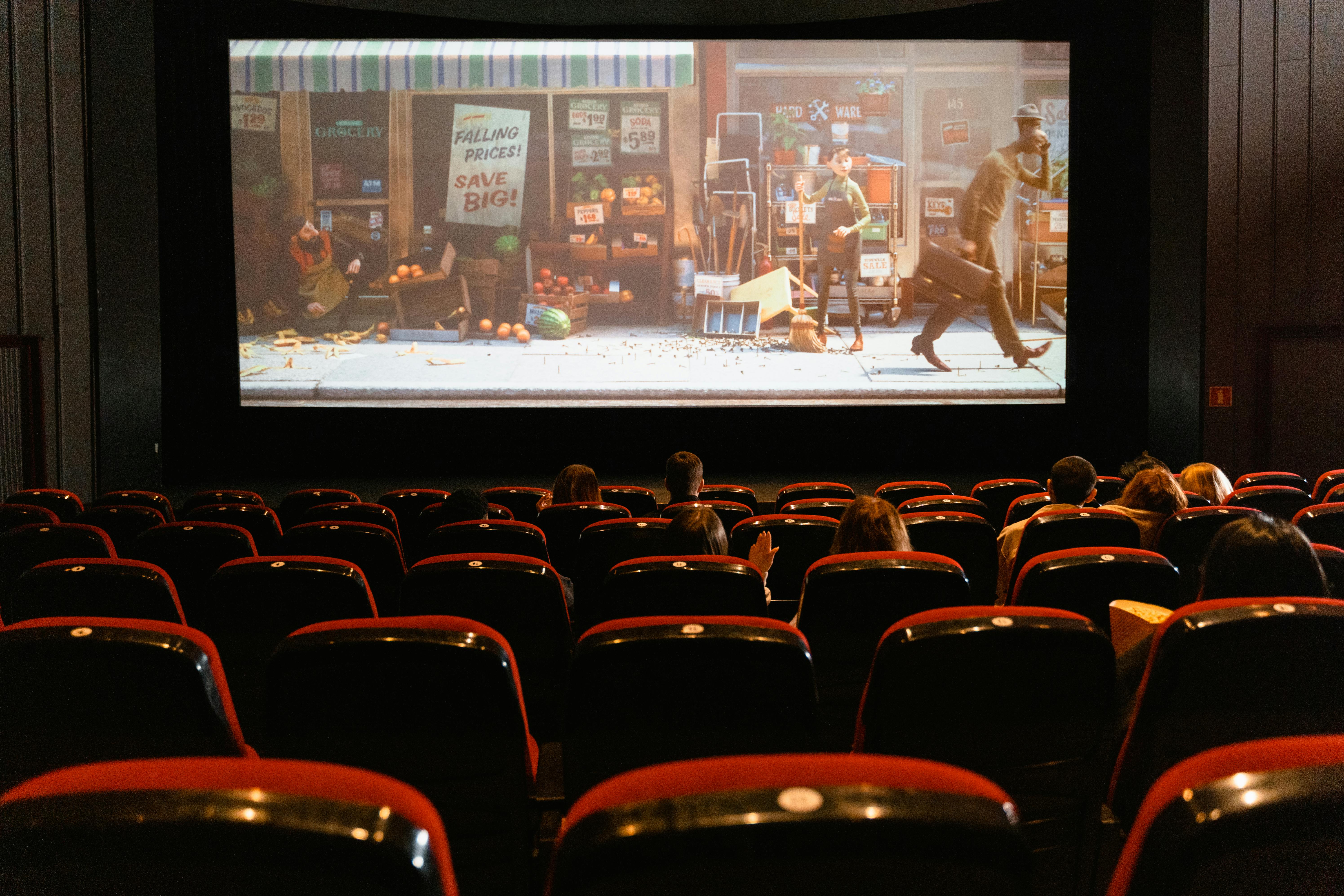 Point of view from a seat in the cinema room, watching an animated movie